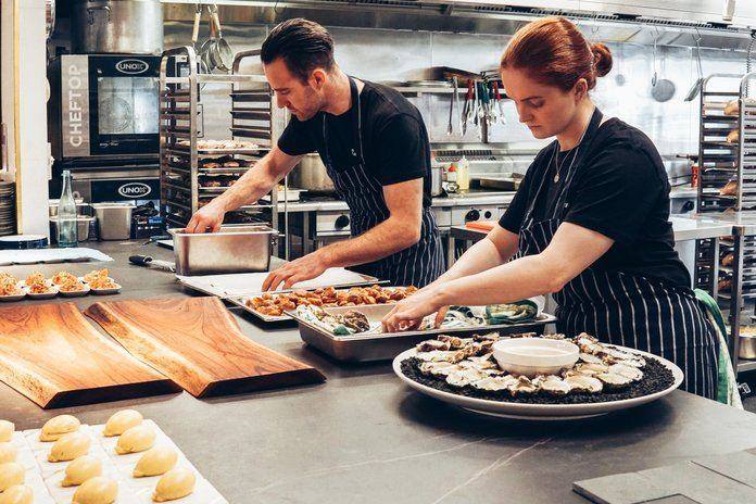 Cloud kitchen chefs preparing the orders